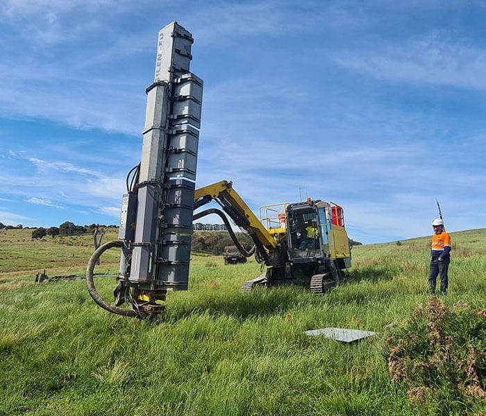 Atlas Copco D9C working on grassy hill