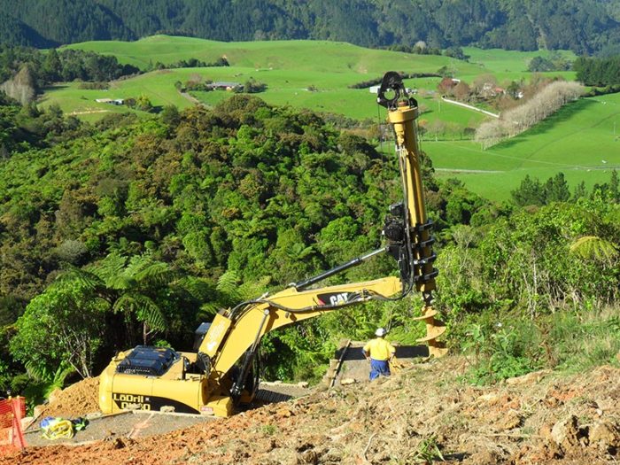 LōDril DH40 CAT Piling Rig working on hillside